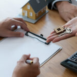 Signing a house purchase contract between the buyer and the sell